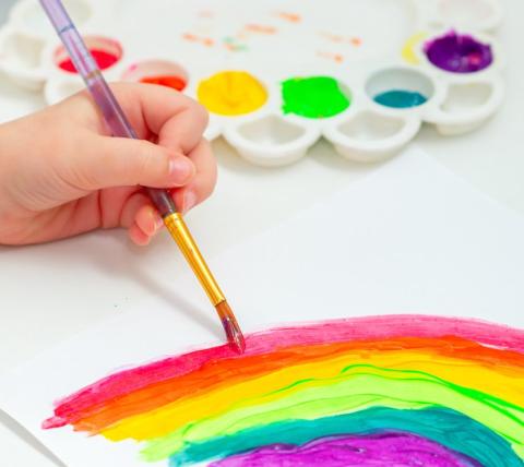 Close up of hands painting