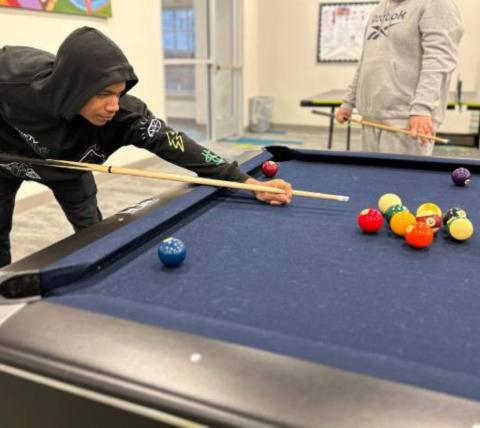 Teens playing table games