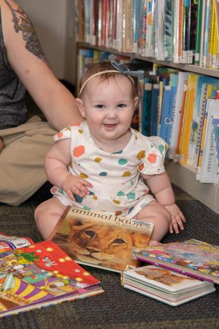 Baby with books