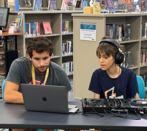 Teen learning how to dj