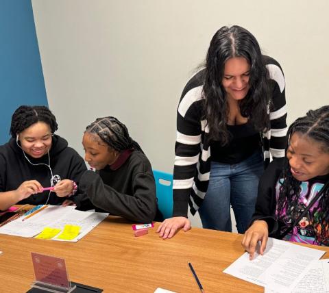 Teens participating in poetry worshop