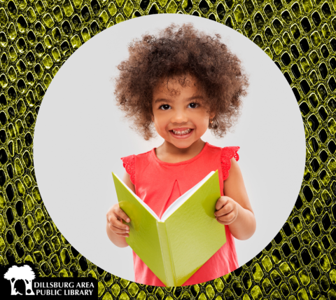 Preschooler reading a book