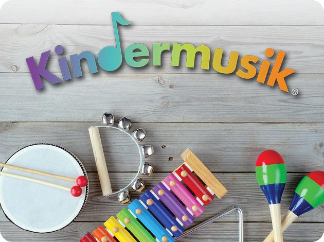 logo of the kindermusik program with a picture of instruments on the floor