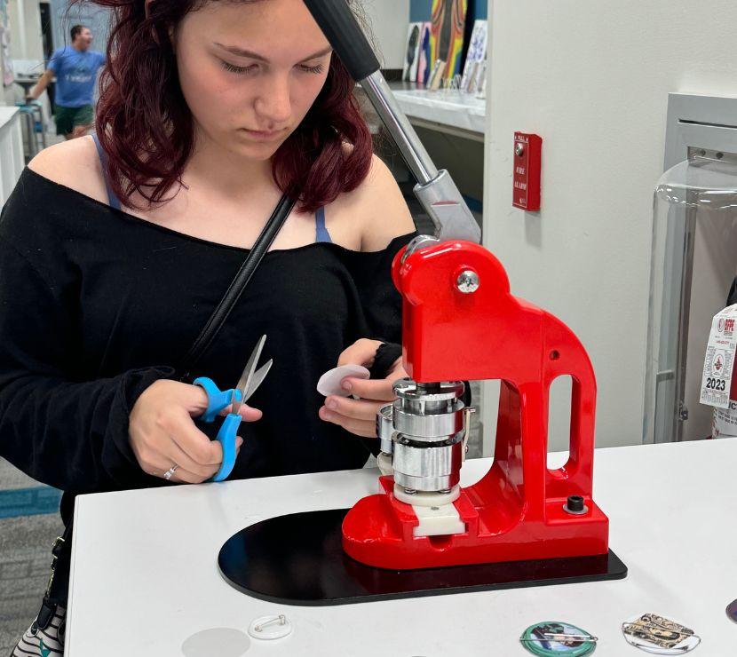 Teens and button making