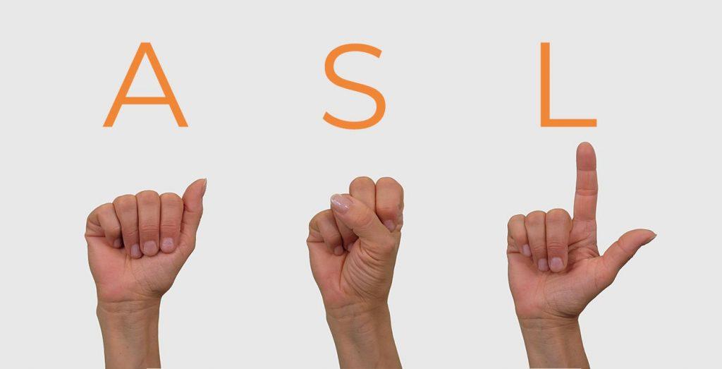 3 hands making the signs for A S and L