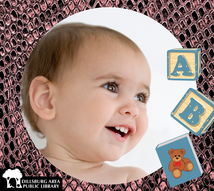 Baby looking at blocks and a book