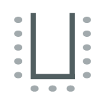 Tables formed in a U-shape with chairs lined on outside edge; chairs facing toward center.